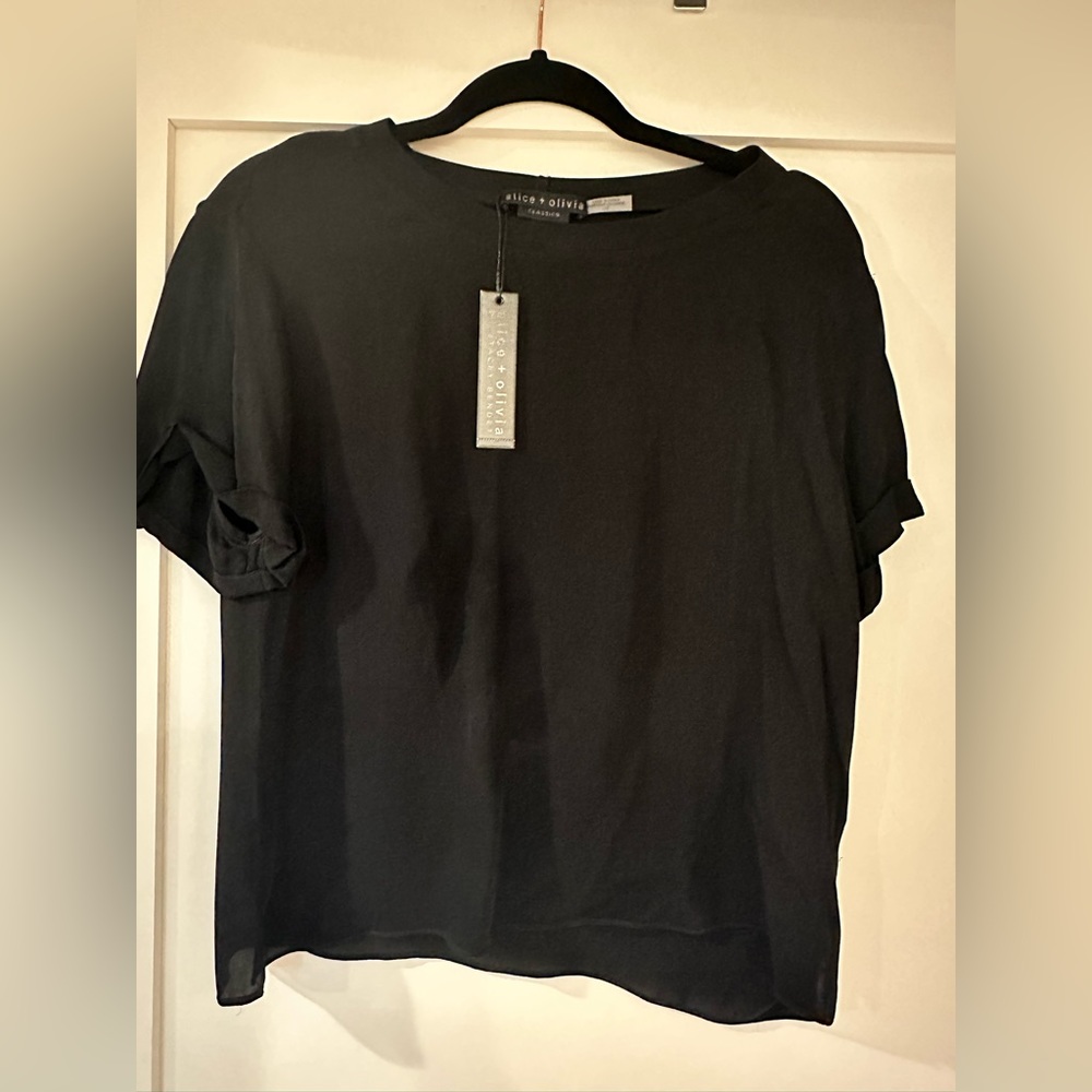 Alice and Olivia black shirt. Rolled sleeve